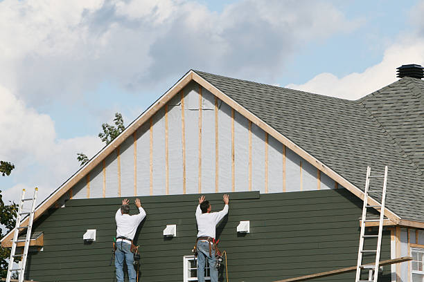 Professional Siding Installation technician working in Arlington, MN